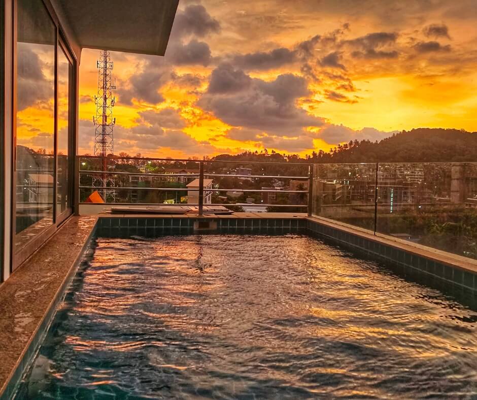 sunset over rooftop pool